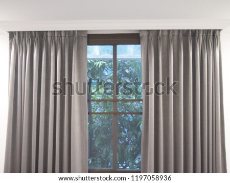 Grey curtain window interior decoration in living room with light