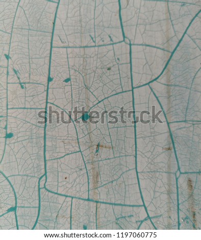Old blue broken car on the wall. Abstract background