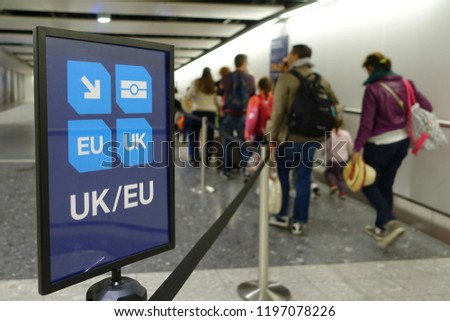 View of a Generic UK/EU Lane Sign as Air Travellers Proceed to Passport Control at a British Airport  Royalty-Free Stock Photo #1197078226