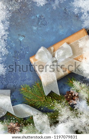 Christmas blue background with gift boxes and xmas tree. Christmas tree decoration and copy space for your text