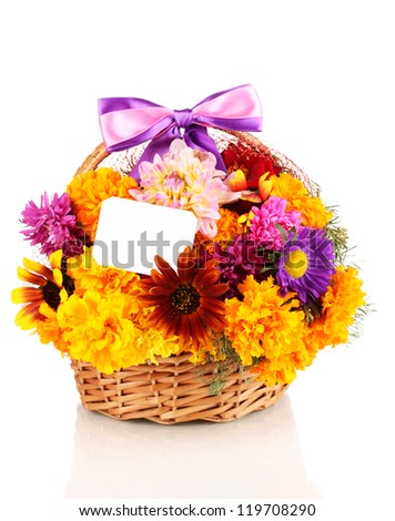 Beautiful bouquet of bright flowers in basket with paper note isolated on white