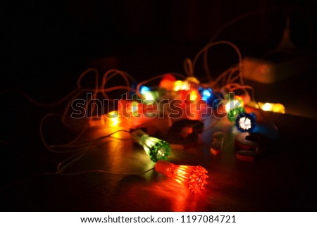 Christmas garland on the wooden table