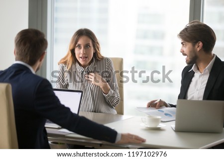 Angry man shouting at indignant shocked female colleague, blaming for mistake in front of boss. Disagreement, misunderstanding, bad negotiations, arguing, showing disrespect, gender discrimination.