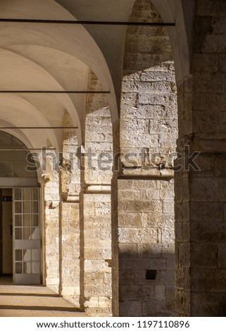 arches of the cloister, in the convent of San Francesco in Gubbio (Italy)