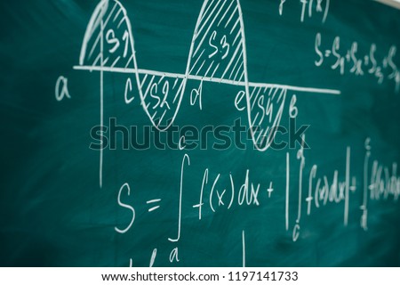 Mathematics lesson differential and integral calculus Chalkboard. Royalty-Free Stock Photo #1197141733