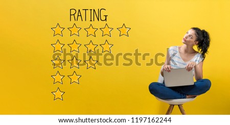 Rating theme with young woman using a laptop computer 