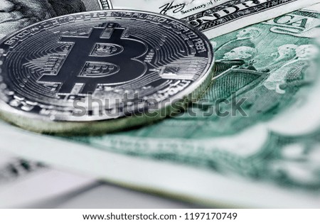 Bitcoin coin on us dollar close up