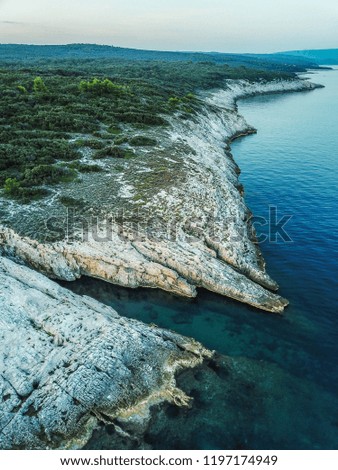 Rocky coastline of Adriatic sea in summer. Aerial view shot on drone in Croatia.