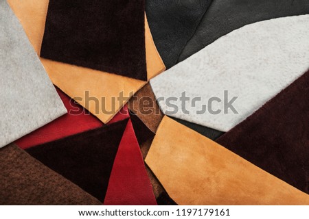 A top down view on multi-colored pieces of leather