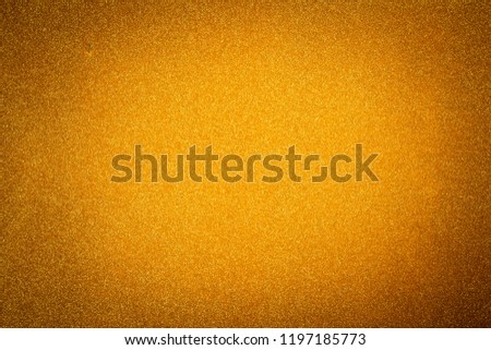 Vignetted golden new year glittering background