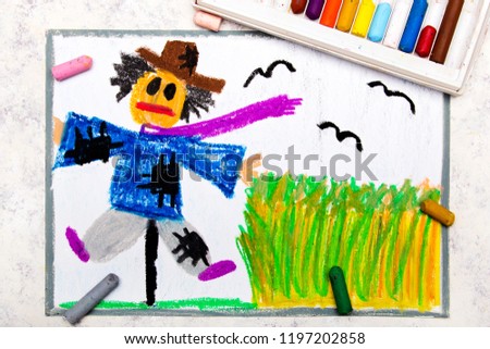 Colorful hand drawing: scary scarecrow next to the grain field