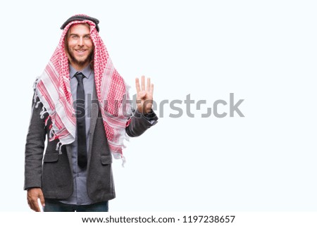 Young handsome arabian man with long hair wearing keffiyeh over isolated background showing and pointing up with fingers number four while smiling confident and happy.