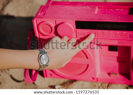 Retro portable stereo cassette recorder on the Beach