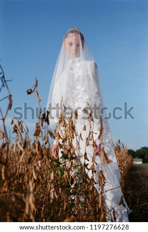 Beautiful bride in a white wedding costume