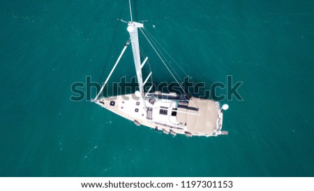Aerial drone birds eye view of sail boat docked in the Ionian sea, Greece