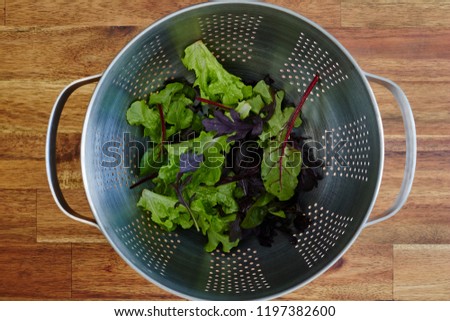 A studio photo of a food strainer