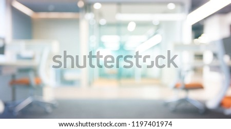 Tables and chairs and corridors in a modern style office,Blurred photos taken outside the focus
