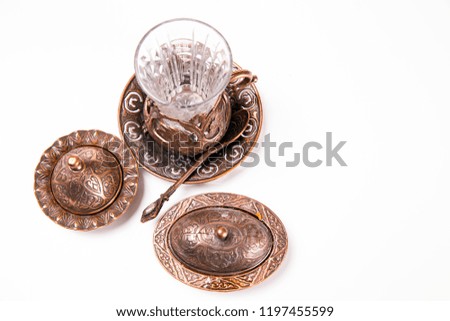 Turkish tea set. Ottoman teacup with traditional arabic ornaments on white background