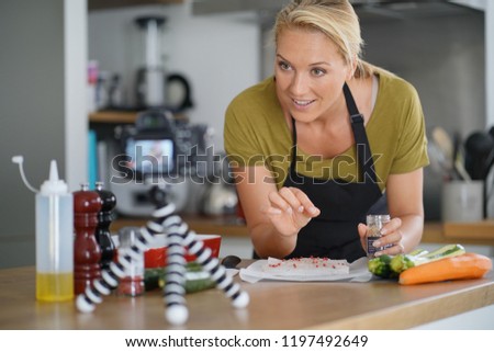 Woman cooking for culinary blog