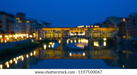 Blurred picture of Ponte Vecchio in Florence in Italy / Background picture with nice bokeh