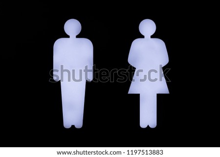 silhouette of a man and a woman on a black background