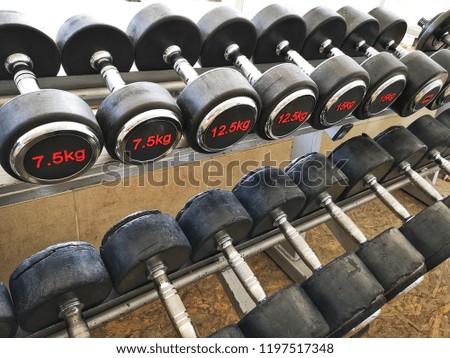 Weight Stand For New and Old Dumbbells (All Sizes) In A Row.
Picture taken in Gym.