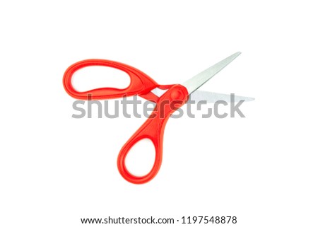 Scissors with plastic red handles isolated on white background , objects copy space