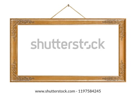 Old wooden picture frame hanging on a rope isolated on white background