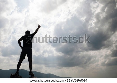 silhouette man on the sky