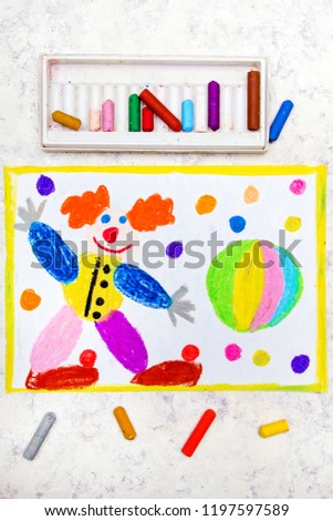 Colorful hand drawing: Friendly smiling clown and rainbow ball