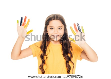beautiful happy kid showing colorful painted hands and smiling at camera isolated on white  