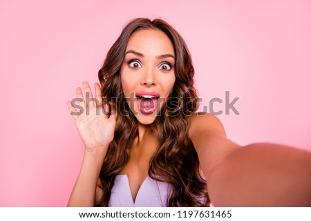Self-portrait of nice adorable attractive cute gorgeous positive gentle magnificent good-looking shocked wavy-haired girl, isolated over pink background