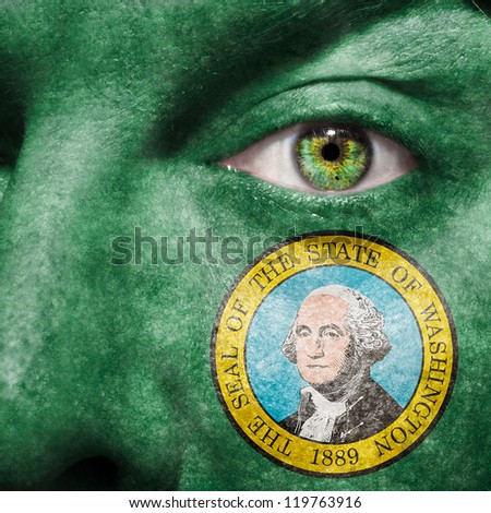 Flag painted on face with green eye to show Washington support