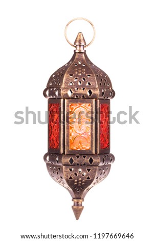 Ramadan lantern isolated. Arabic decoration lamp with burning light isolated on white background. Royalty-Free Stock Photo #1197669646