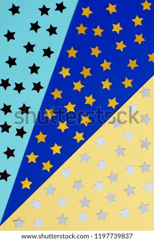 Group of color stars. Holiday background with color stars on color background. Frame with stars. Scattered stars border. Shiny star shaped confetti. top view object design decoration christmas