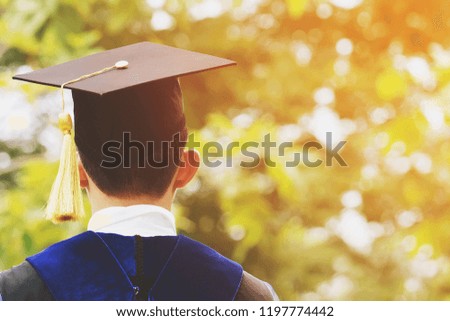 shot of backside young male graduation hats during commencement success, Concept education congratulation the graduates in University outdoors. 