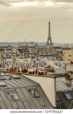 Paris roofs panoramic overview at summer day, France, traditional postcard picture, Europe