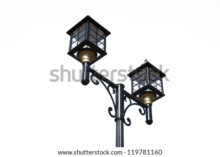 Twin pole mounted lanterns are isolated on white background