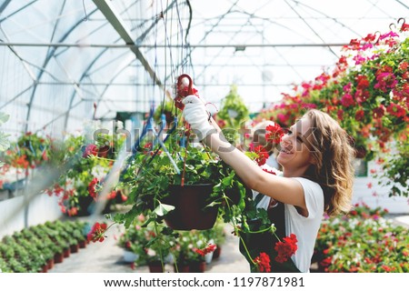 Young florist at  her job