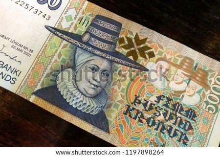 Icelandic cash. Money of Iceland. 5000 Icelandic krona bill on wooden table. Icelandic krona is the national currency of Iceland (kronur) Royalty-Free Stock Photo #1197898264