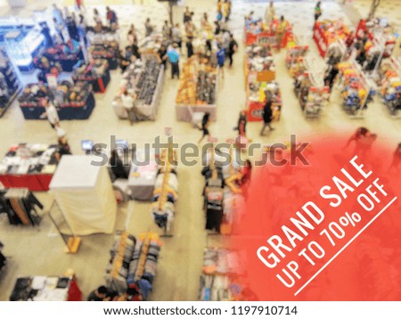Sale advertising poster with white text "GRAND SALE UP TO 70% OFF" in red circle at the corner.