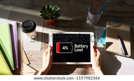 Battery low message and icon on device screen.         