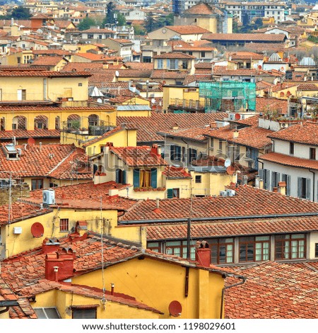Aerial view. Red tile roofs of residential buildings in the old city. Urban landscape. West Europe. 