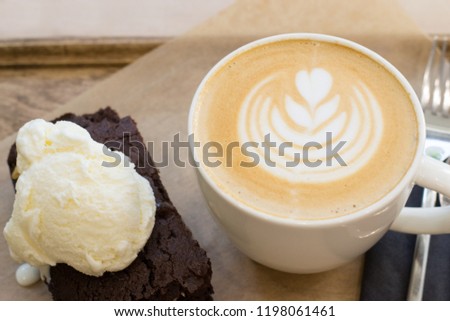 Brownie with ice creem and cappuccino