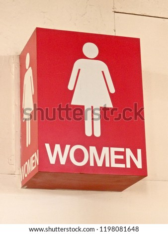 Women's red bathroom sign. 