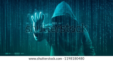 the dark web hooded hacker  Royalty-Free Stock Photo #1198180480