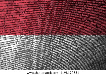 Indonesia flag  is depicted on the screen with the program code. The concept of modern technology and site development
