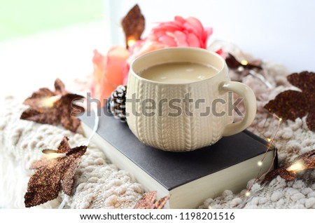 cozy fall arrangement with coffee