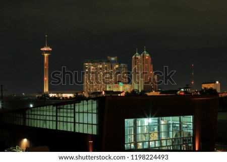 Night view of the skyline of the city of San Antonio, Texas, USA, as viewed from the Hays Street pedestrian bridge located northeast of downtown.