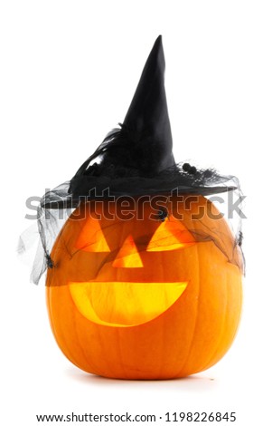 Jack O Lantern Halloween pumpkin with witches hat isolated on white background